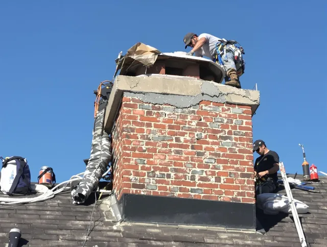 Altadena Chimney Sweep installing a custom chimney crown in Altadena, CA