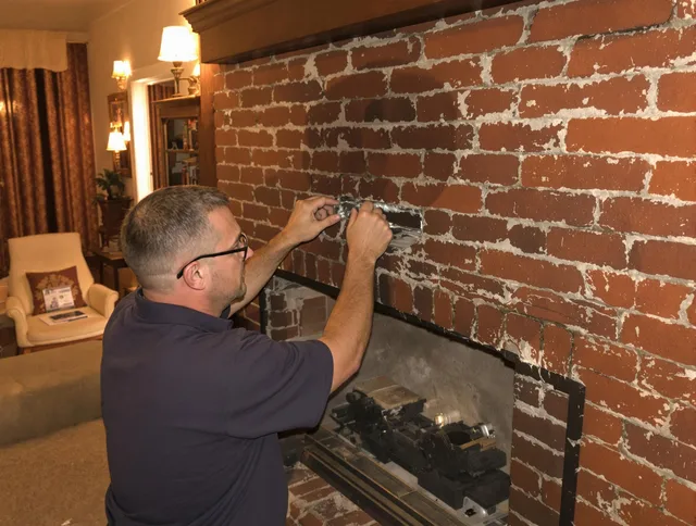 Altadena Chimney Sweep expert fixing a fireplace in Altadena, CA